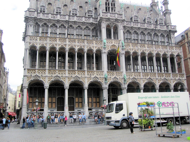 adler van in front of ornate building